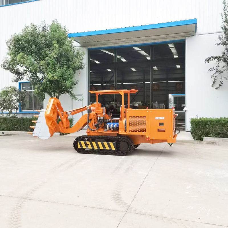 Carregador de descarga lateral