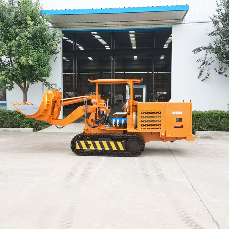 Chargeuse à roches à benne latérale chenillée